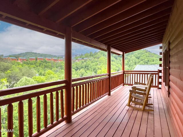 2316 Boulder Way, Sevierville, TN 37862 - wooden terrace with a wooded view and a mountain view