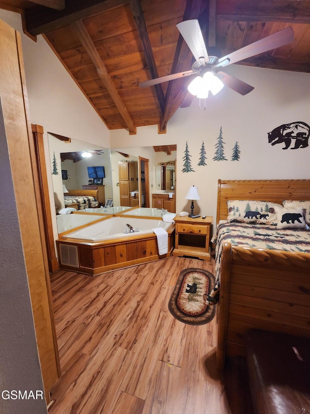 bedroom featuring vaulted ceiling with beams, ceiling fan, wood ceiling, and hardwood / wood-style flooring