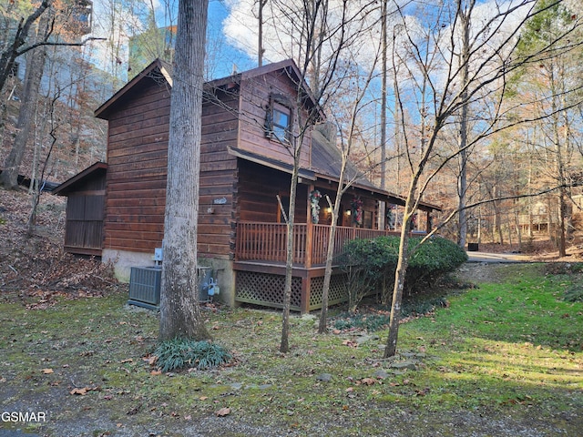 exterior space with a deck and a yard