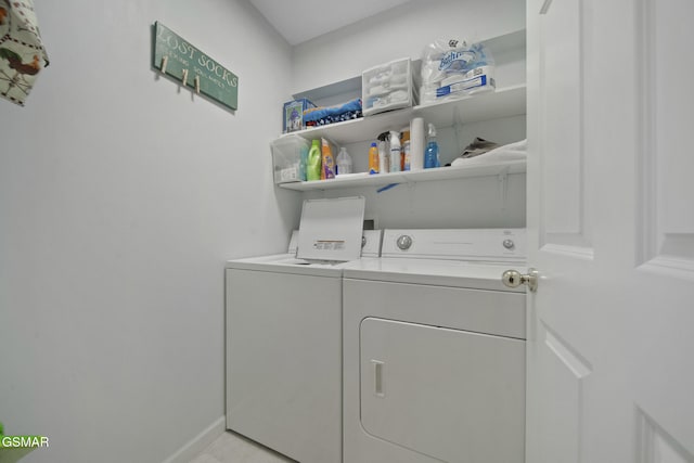 523 Apple View Way Unit 409, Sevierville, TN 37862 - washroom featuring washer and dryer and baseboards