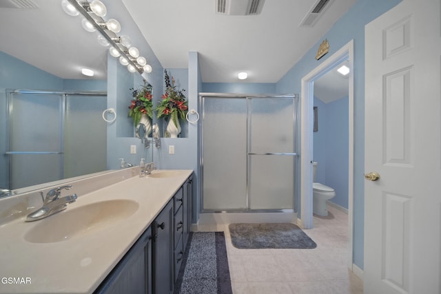 523 Apple View Way Unit 409, Sevierville, TN 37862 - full bathroom featuring double vanity, a shower stall, and tile patterned flooring