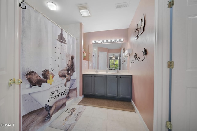 523 Apple View Way Unit 409, Sevierville, TN 37862 - full bath with double vanity, tile patterned flooring, and a shower with shower curtain
