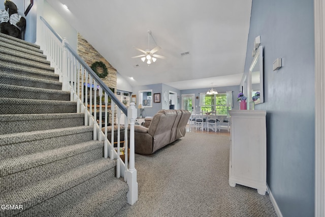 523 Apple View Way Unit 409, Sevierville, TN 37862 - carpeted living area featuring stairway, ceiling fan, a chandelier, and high vaulted ceiling