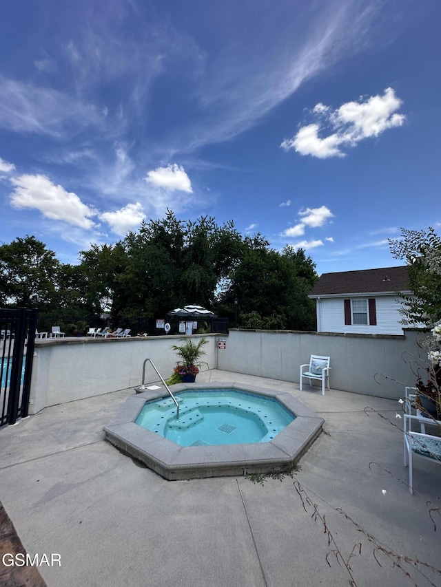 523 Apple View Way Unit 409, Sevierville, TN 37862 - view of pool with a community hot tub and a patio