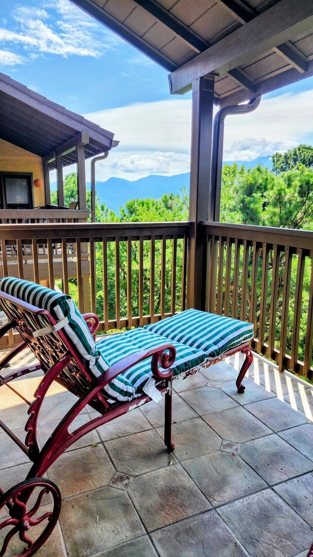 balcony featuring a mountain view