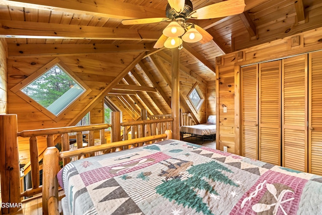 bedroom with wood ceiling, a closet, wooden walls, and lofted ceiling with beams