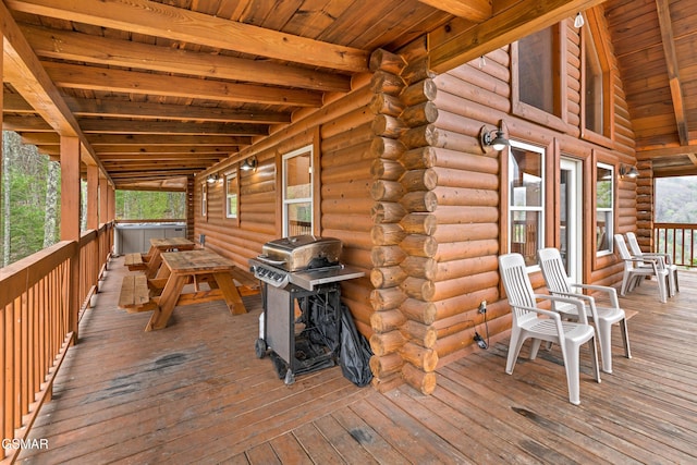 wooden deck with grilling area