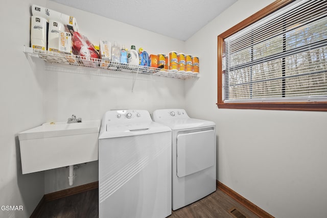 3430 Laurel Ridge Way, Sevierville, TN 37862 - washroom featuring dark wood finished floors and washing machine and dryer