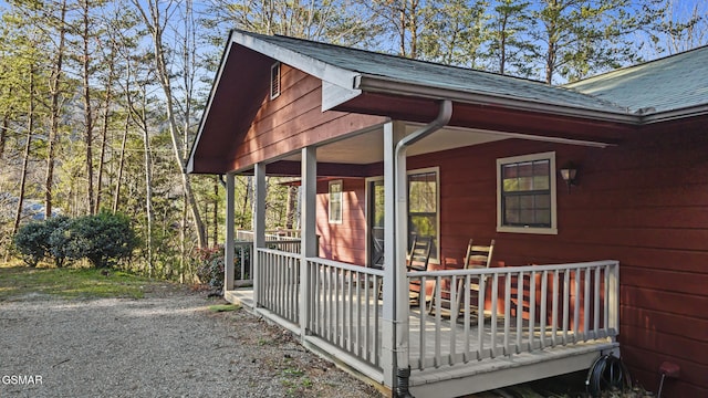 3430 Laurel Ridge Way, Sevierville, TN 37862 - view of side of property with a shingled roof and covered porch
