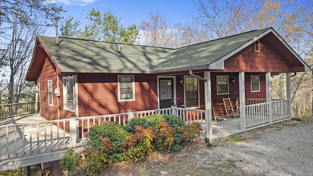 3430 Laurel Ridge Way, Sevierville, TN 37862 - rustic home featuring covered porch and a shingled roof
