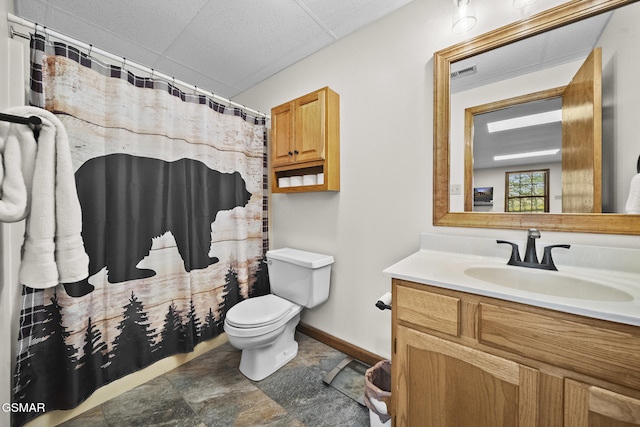 3430 Laurel Ridge Way, Sevierville, TN 37862 - bathroom with vanity, a paneled ceiling, stone finish floors, and curtained shower