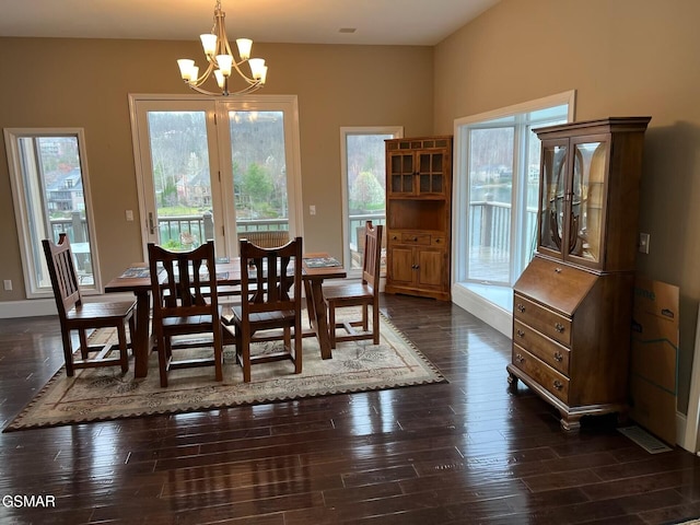 20 Brixton Ln, Crossville, TN 38555 - dining area featuring dark wood-type flooring, an inviting chandelier, and baseboards