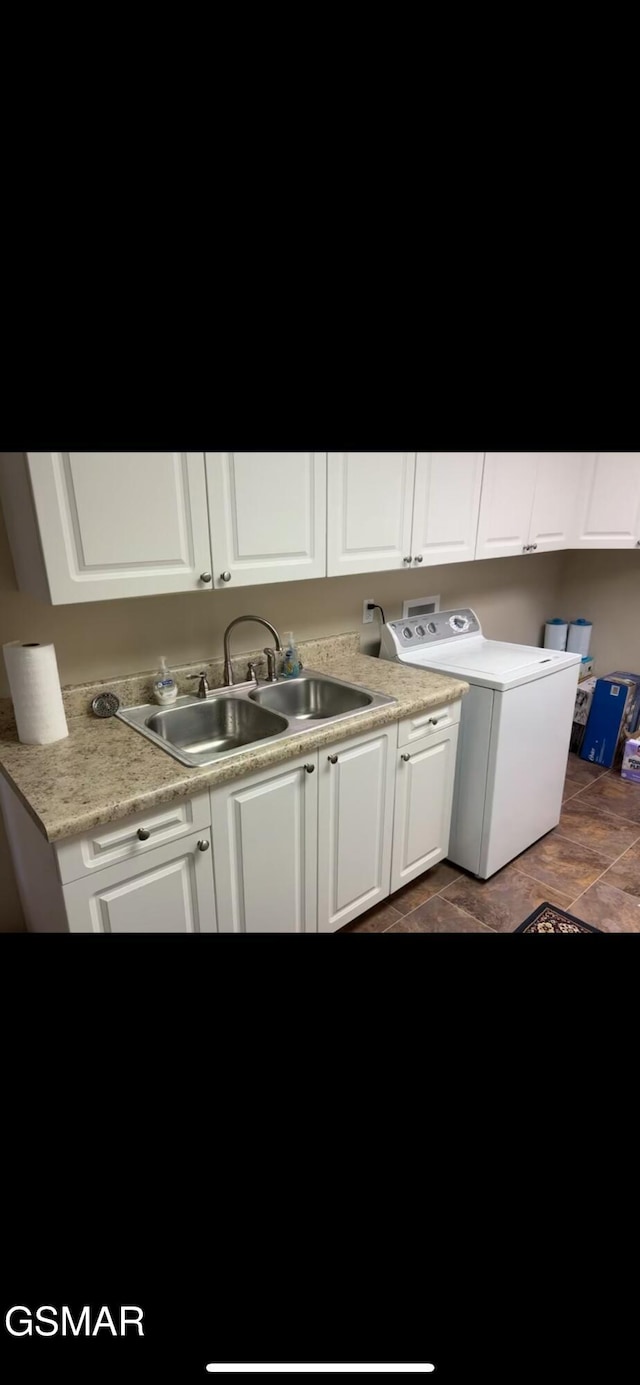 20 Brixton Ln, Crossville, TN 38555 - kitchen featuring white cabinets, washer / dryer, light countertops, and a sink
