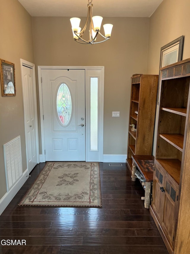 20 Brixton Ln, Crossville, TN 38555 - entrance foyer featuring a chandelier, dark wood-style flooring, baseboards, and visible vents
