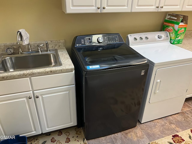 20 Brixton Ln, Crossville, TN 38555 - laundry area featuring cabinet space, washing machine and clothes dryer, and a sink