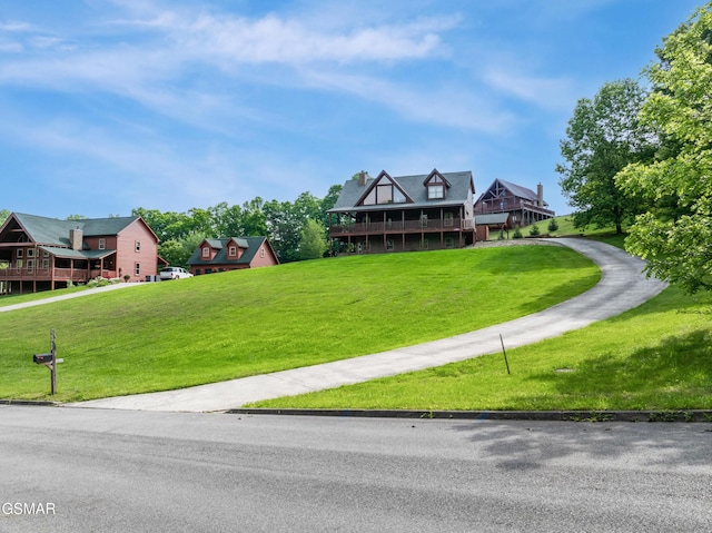 3391 Clear Valley Dr, Sevierville, TN 37862 - view of front of home with a front yard and a deck