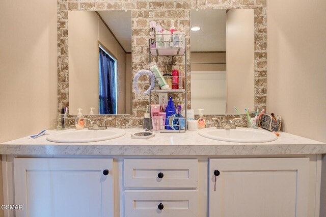 bathroom with double vanity