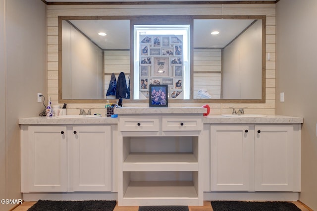 bathroom with vanity and recessed lighting
