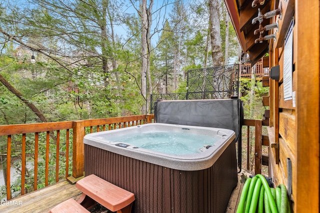 deck with a hot tub