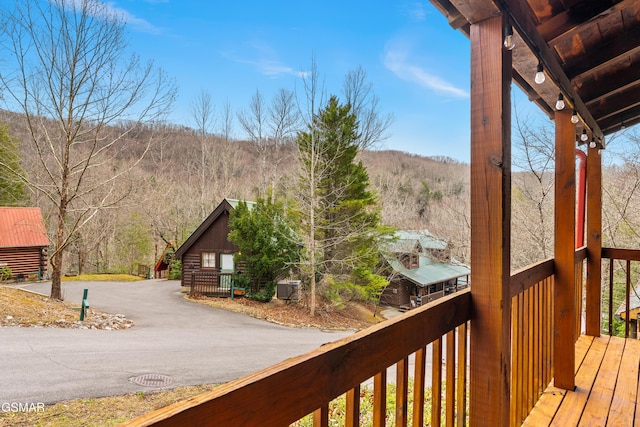 wooden terrace with driveway