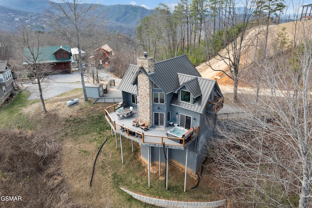 drone / aerial view featuring a mountain view