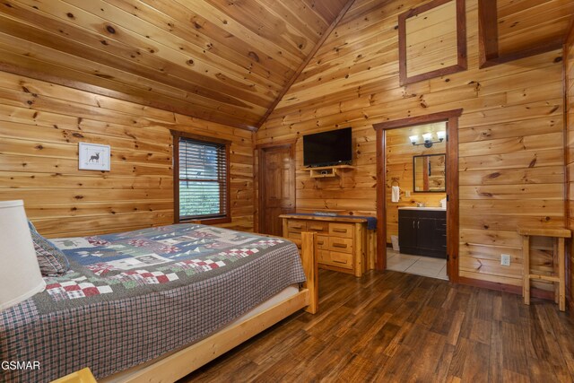 bedroom featuring wood walls, wooden ceiling, dark wood-type flooring, lofted ceiling, and ensuite bathroom