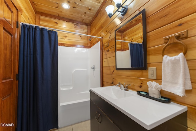 bathroom featuring shower / tub combo, tile patterned floors, vanity, wooden ceiling, and wood walls