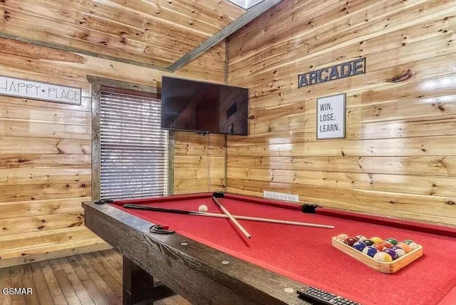 recreation room with wooden walls, pool table, wood ceiling, and hardwood / wood-style floors