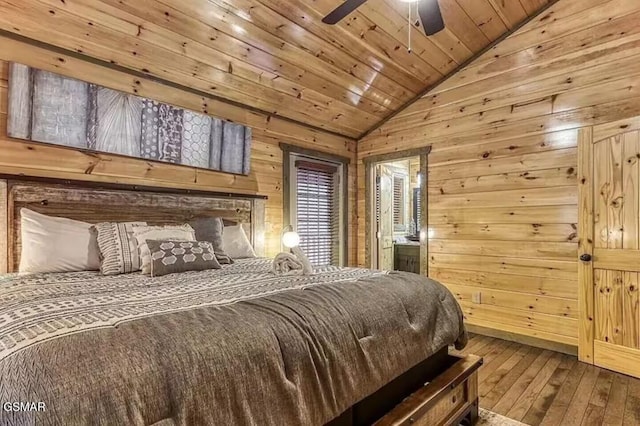 bedroom featuring hardwood / wood-style floors, vaulted ceiling, wood ceiling, and wood walls