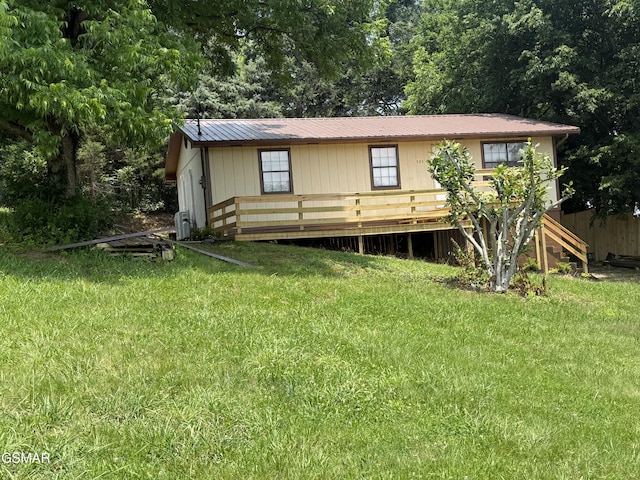 525 Freeman Ave, Newport, TN 37821 - back of property with a yard and metal roof