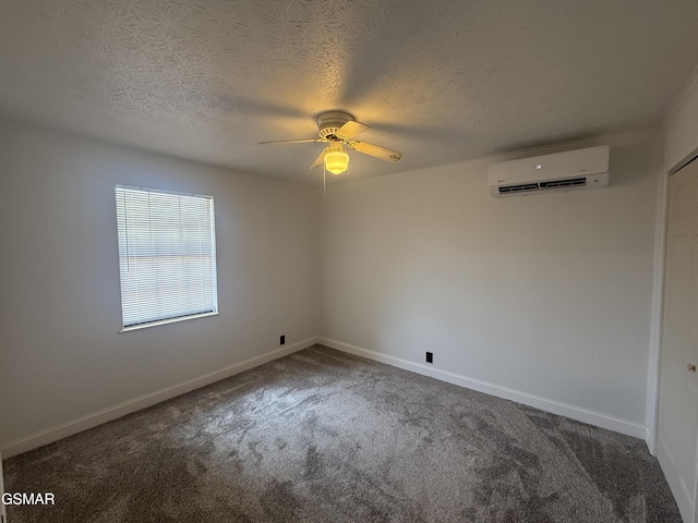 525 Freeman Ave, Newport, TN 37821 - carpeted spare room with a wall unit AC, ceiling fan, a textured ceiling, and baseboards