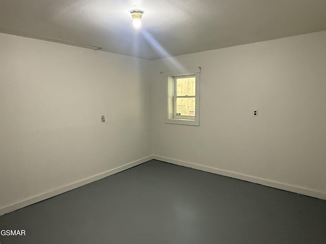 525 Freeman Ave, Newport, TN 37821 - empty room with baseboards and concrete flooring