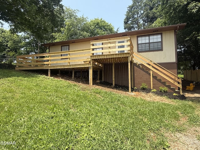 525 Freeman Ave, Newport, TN 37821 - rear view of house featuring a lawn, a wooden deck, and stairs