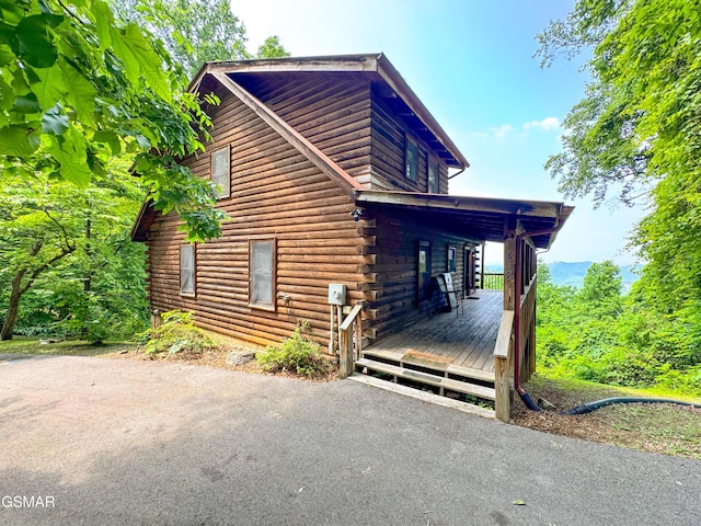 2438 Walnut Ridge Way, Sevierville, TN 37862 - view of home's exterior featuring log siding and a deck