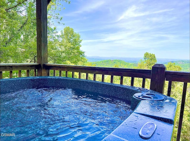 2438 Walnut Ridge Way, Sevierville, TN 37862 - wooden terrace featuring a hot tub