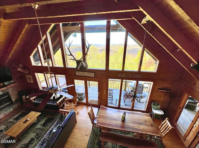 2438 Walnut Ridge Way, Sevierville, TN 37862 - living area with wooden walls, a fireplace, and wood finished floors