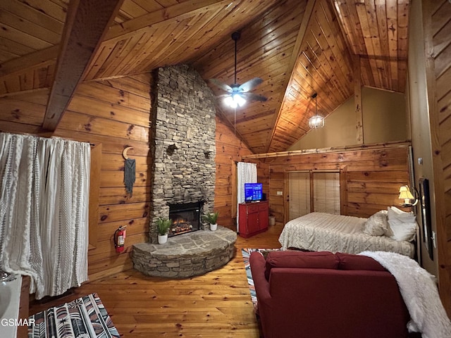 bedroom with wooden walls, wood-type flooring, and wooden ceiling