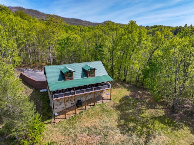 859 Pinnacle Vista Rd, Gatlinburg, TN 37738 - back of property with a view of trees, stone siding, and a metal roof