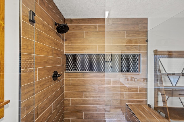 859 Pinnacle Vista Rd, Gatlinburg, TN 37738 - full bath with tiled shower and a textured ceiling