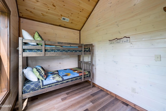 923 Osprey Way, Pigeon Forge, TN 37863 - bedroom featuring lofted ceiling, wood walls, wood ceiling, wood finished floors, and a sauna / steam room