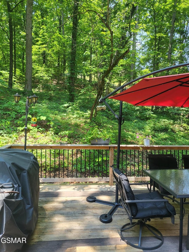 928 E Cross Rd, Dandridge, TN 37725 - deck with a grill and outdoor dining area