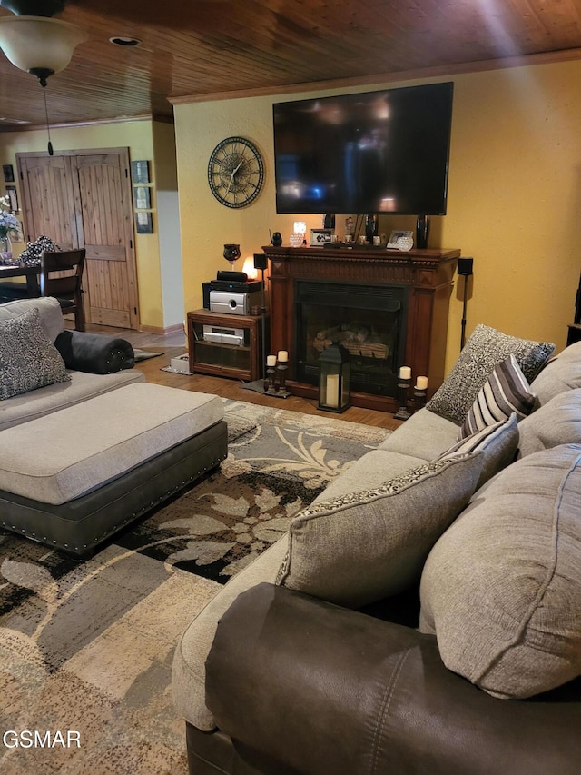 928 E Cross Rd, Dandridge, TN 37725 - living area featuring wood ceiling, a fireplace, and ornamental molding