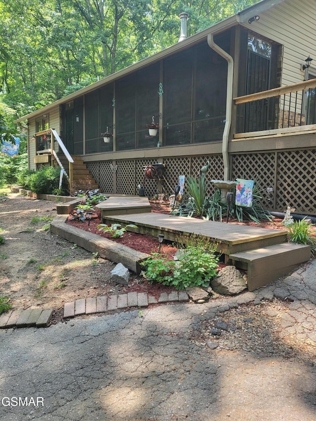 928 E Cross Rd, Dandridge, TN 37725 - view of patio / terrace featuring a sunroom and stairs