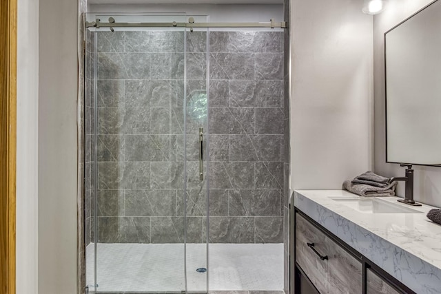 bathroom featuring vanity and walk in shower