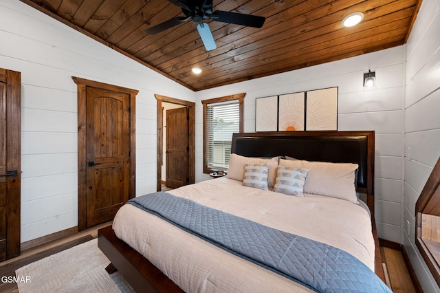 bedroom with lofted ceiling, recessed lighting, wood finished floors, a ceiling fan, and wood ceiling