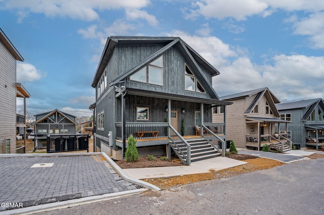 view of front of house featuring a porch and a residential view