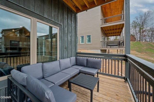 wooden deck with outdoor lounge area