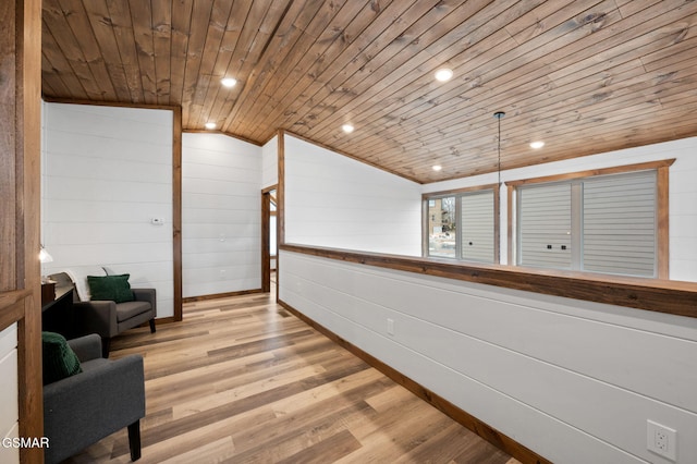 hall featuring light wood-style floors, lofted ceiling, wood ceiling, and recessed lighting