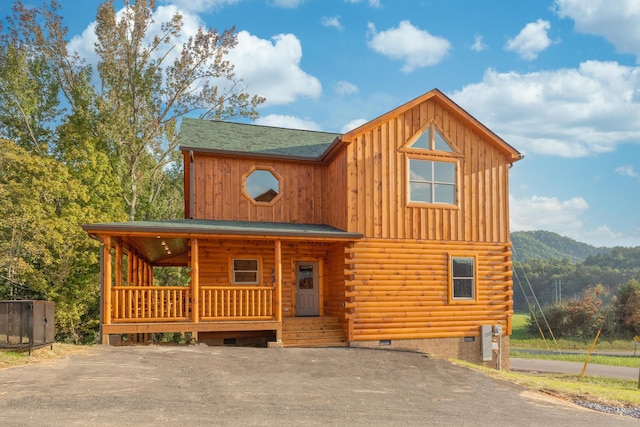 log home with a mountain view