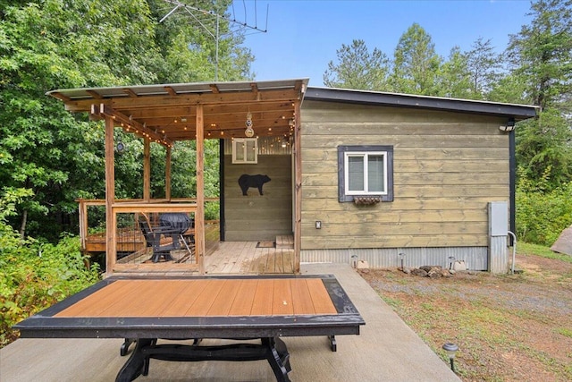 view of patio featuring a wooden deck